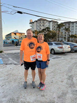 Jackie Goergen posing with Joe Goergen before a race.