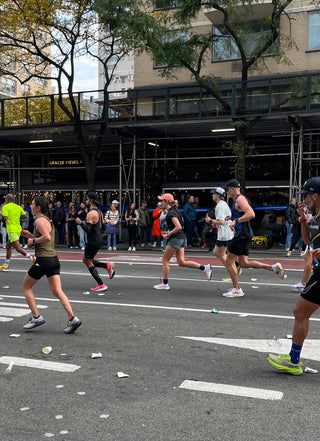 Jackie Whelan passing spectators around mile 18 during the New York City Marathon.