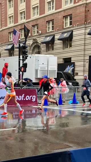 Jackie Whelan heading towards the finish of the Boston Marathon on a very rainy April day.