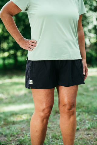 This 3.75 inch pair of women’s running shorts with pockets is designed with a lightweight, moisture-wicking fabric. Shorts come in colors black and twilight run blue. 