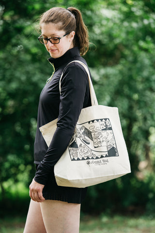 Designed by artist Joey Goergen, this canvas tote bag celebrates our love for running. Sized 20"W x 15"H x 5.5"D, this bag fits all our running essentials.