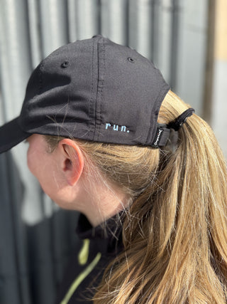 black running hat with light blue "run" stitched on the side